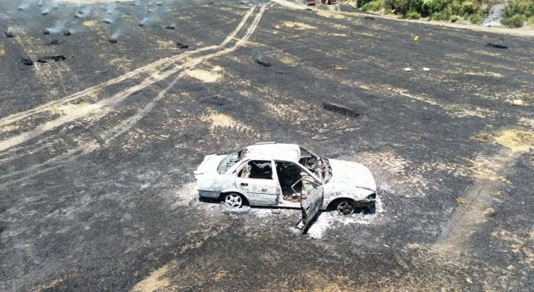 Adana'da park halindeki araçta çıkan yangın ormanlık alana sıçradı