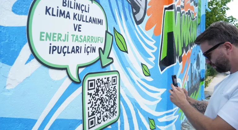 UEDAŞ'tan trafo duvarına klima kullanımında 24 dereceyi öneren grafiti çalışması